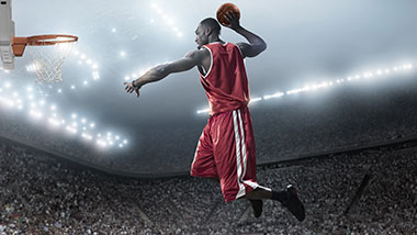 Basketball player dunking