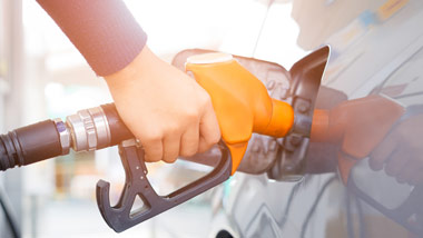 woman pumping gas